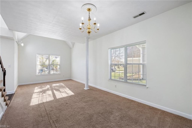 unfurnished room with carpet, a wealth of natural light, lofted ceiling, and an inviting chandelier