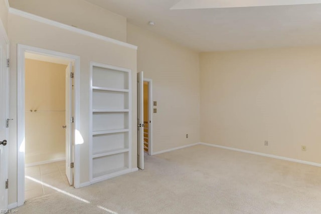 unfurnished bedroom with light carpet