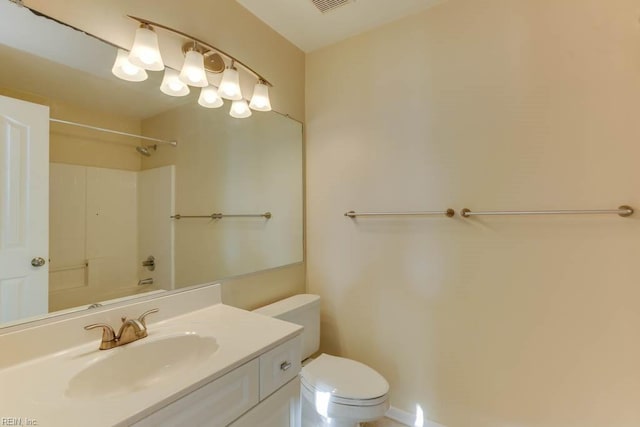 full bathroom featuring shower / tub combination, vanity, and toilet