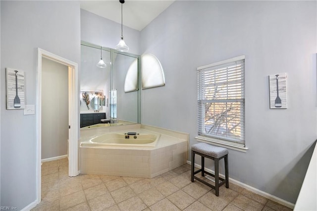 bathroom featuring tiled tub