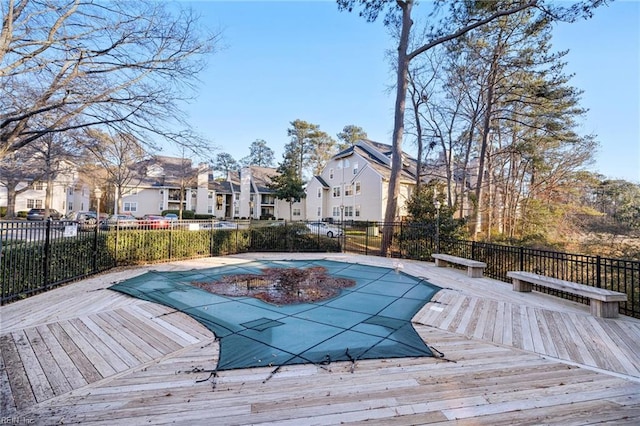 view of pool with a wooden deck