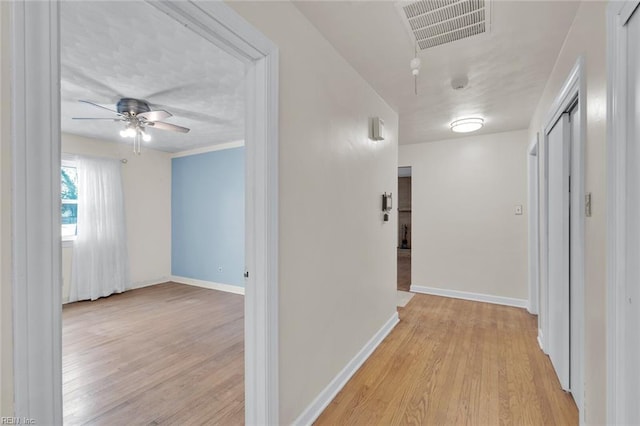 hall featuring light hardwood / wood-style flooring