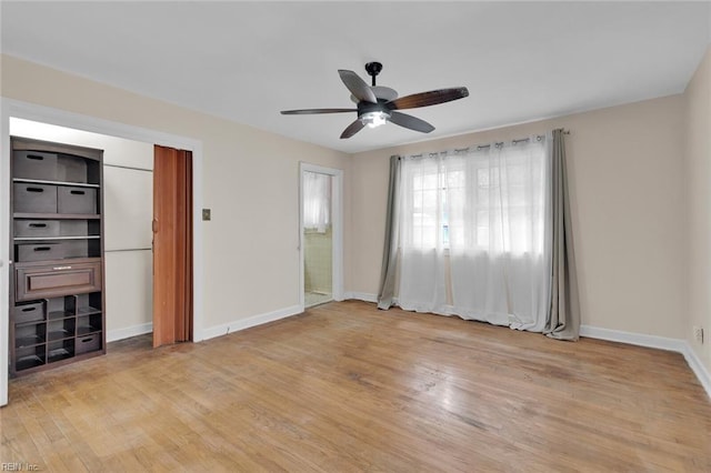 unfurnished bedroom featuring ceiling fan and light hardwood / wood-style flooring