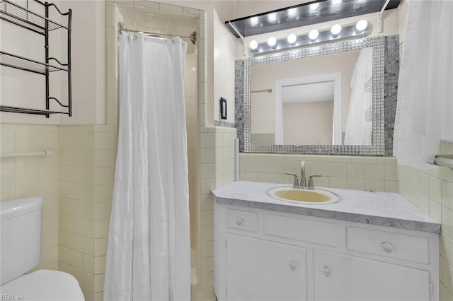 bathroom featuring toilet, tasteful backsplash, tile walls, vanity, and a shower with shower curtain