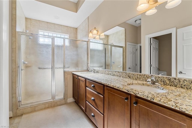 bathroom featuring vanity and walk in shower