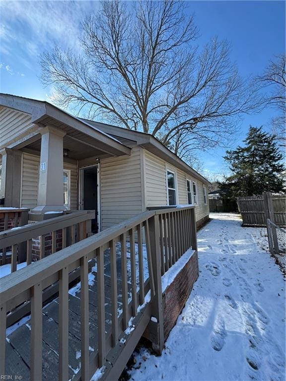 view of snow covered deck