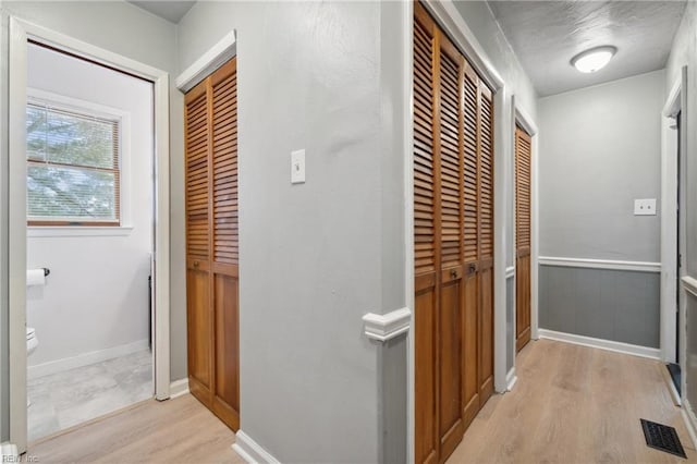 hall featuring light wood-type flooring