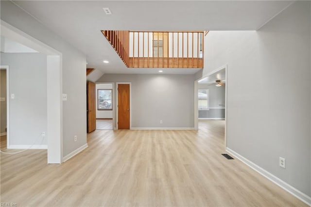 interior space featuring ceiling fan and light hardwood / wood-style floors