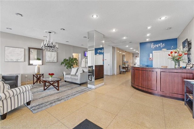 welcome area featuring an inviting chandelier