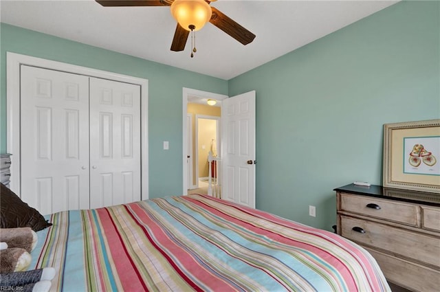 bedroom featuring a closet and ceiling fan