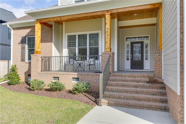 entrance to property with a porch