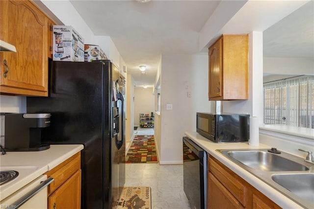 kitchen with sink and black appliances