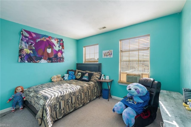 bedroom featuring light colored carpet