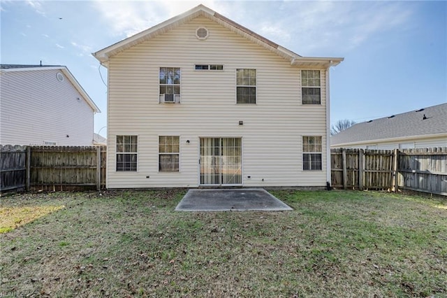 back of house with a yard, cooling unit, and a patio area