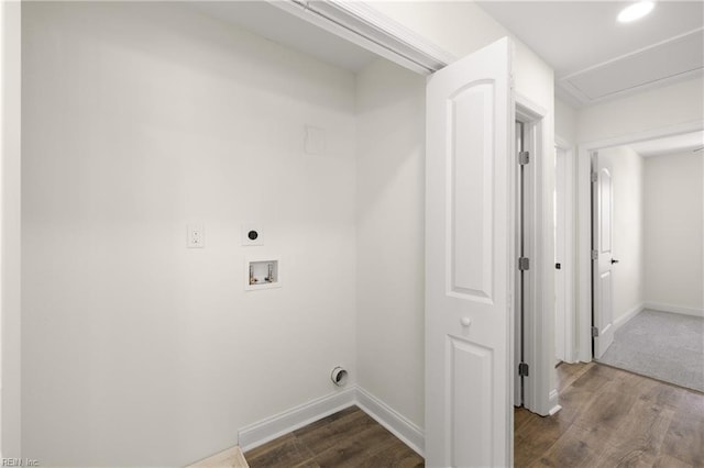 clothes washing area with hookup for a washing machine, hookup for an electric dryer, and dark hardwood / wood-style flooring