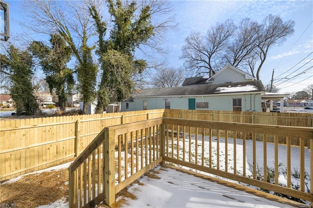 view of snow covered deck