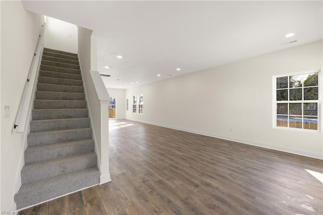 interior space with dark hardwood / wood-style floors