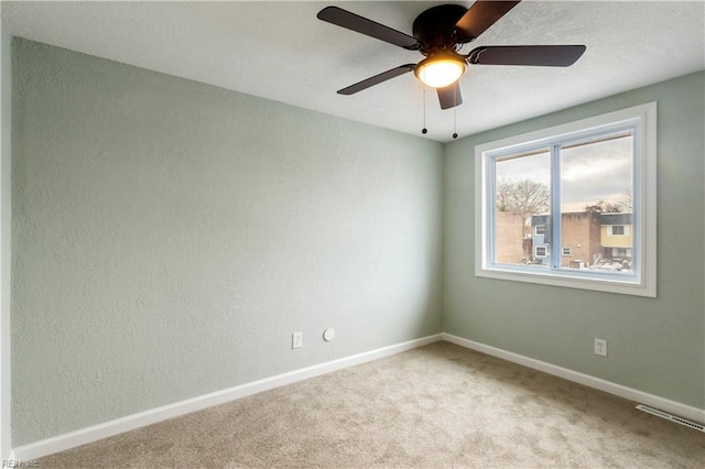 empty room with light colored carpet