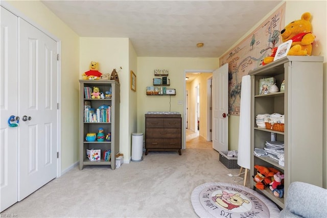 interior space featuring light carpet