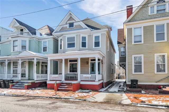 view of front of property featuring covered porch