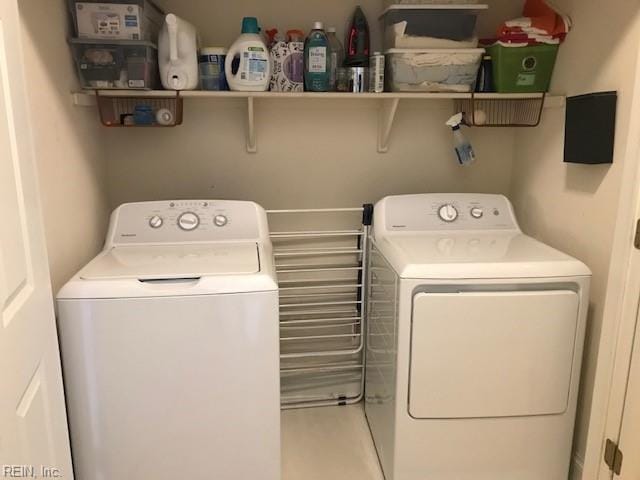 laundry area with washer and dryer