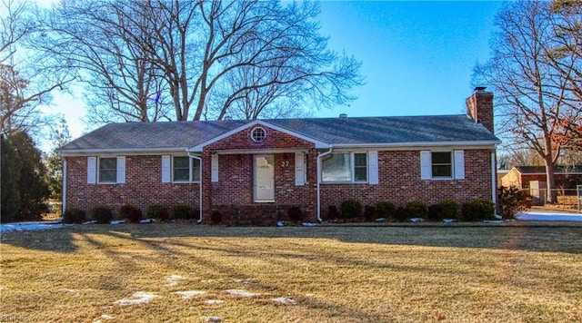 ranch-style house featuring a front lawn