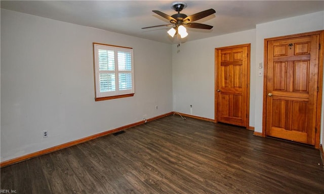 interior space featuring ceiling fan and dark hardwood / wood-style flooring