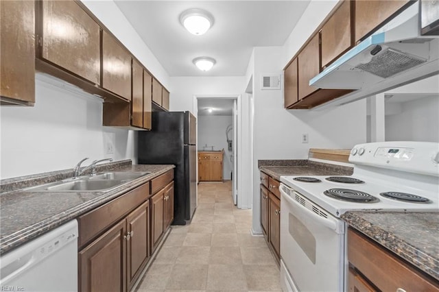 kitchen with sink and white appliances