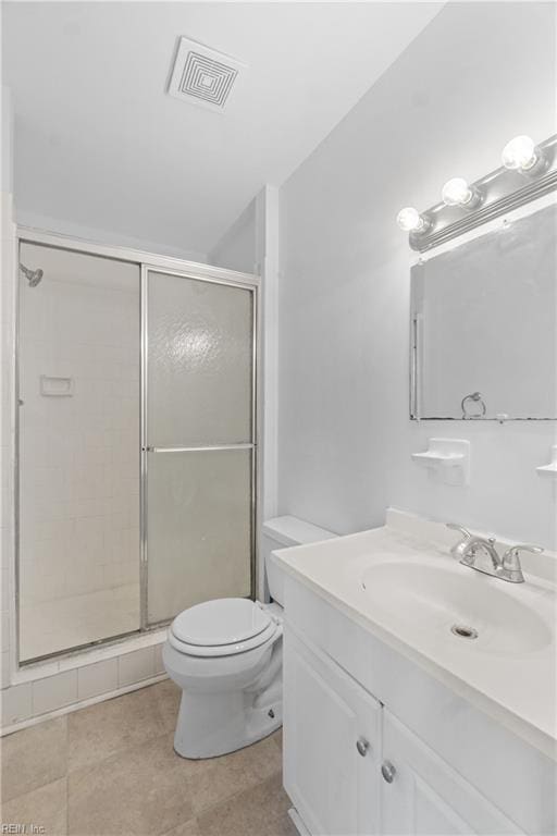 bathroom featuring walk in shower, vanity, and toilet