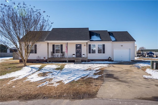 view of front of home featuring a garage and covered porch