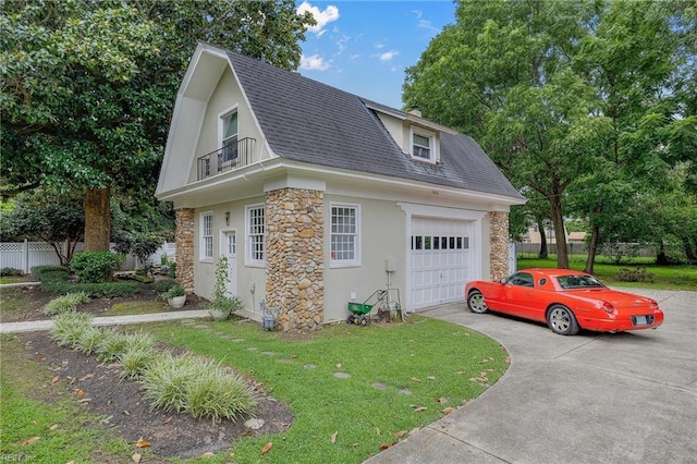 view of property exterior with a balcony, a garage, and a yard