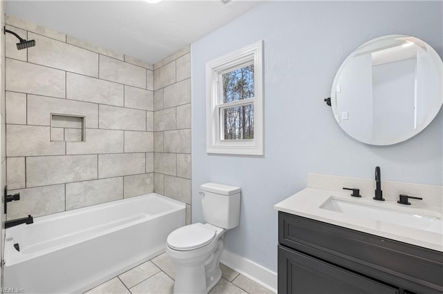 full bathroom featuring tiled shower / bath combo, vanity, tile patterned flooring, and toilet