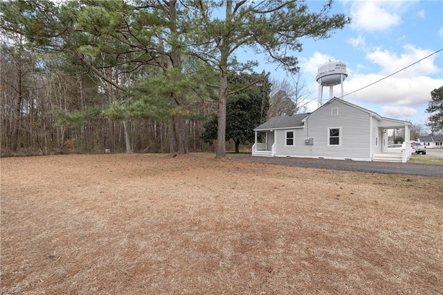 view of yard with a porch