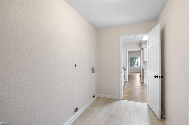 laundry room featuring electric dryer hookup and washer hookup