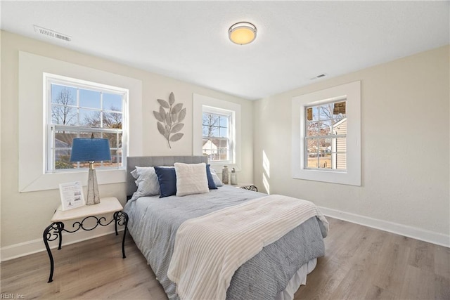 bedroom featuring light hardwood / wood-style flooring