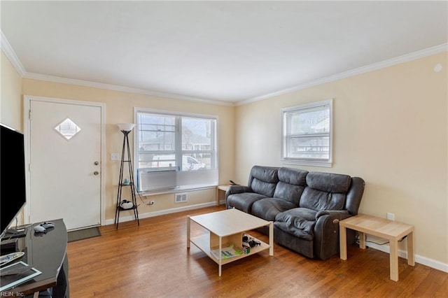 living room featuring crown molding, hardwood / wood-style floors, and cooling unit