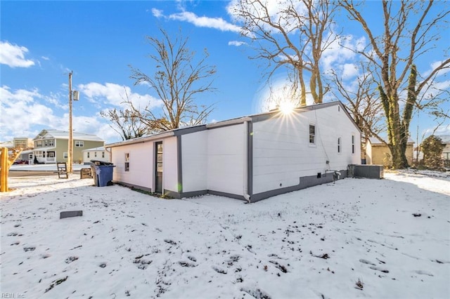 view of snow covered property