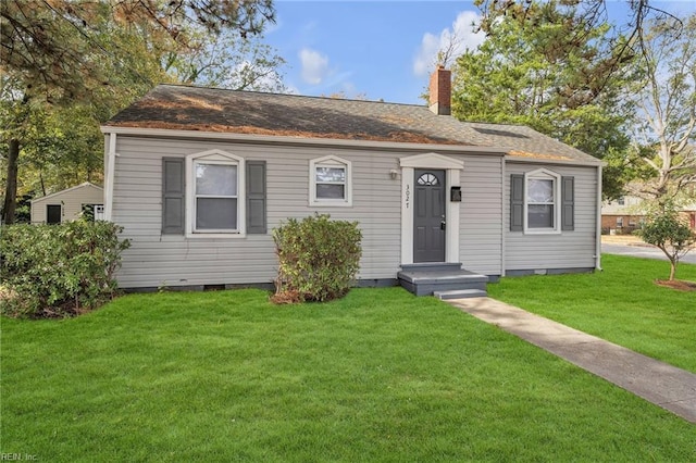 view of front of house with a front lawn