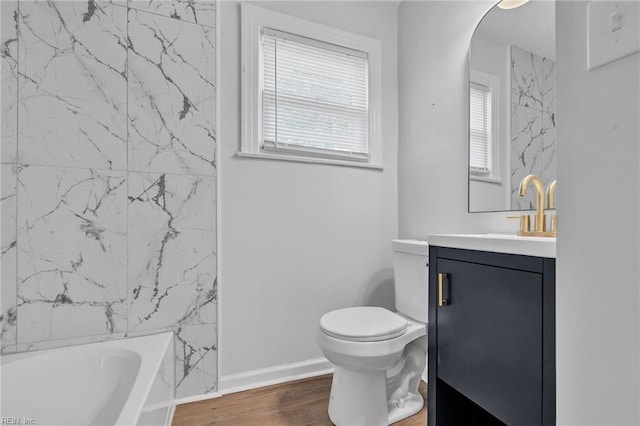 full bathroom featuring shower / bathtub combination, vanity, toilet, and wood-type flooring