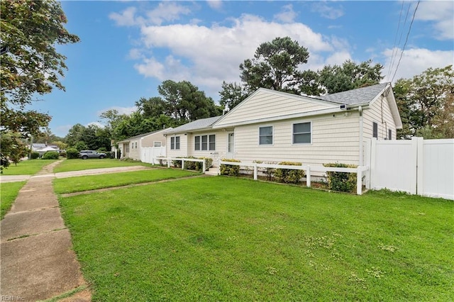 view of front of home with a front yard