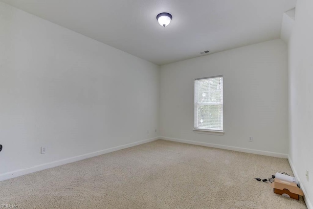 spare room with carpet flooring