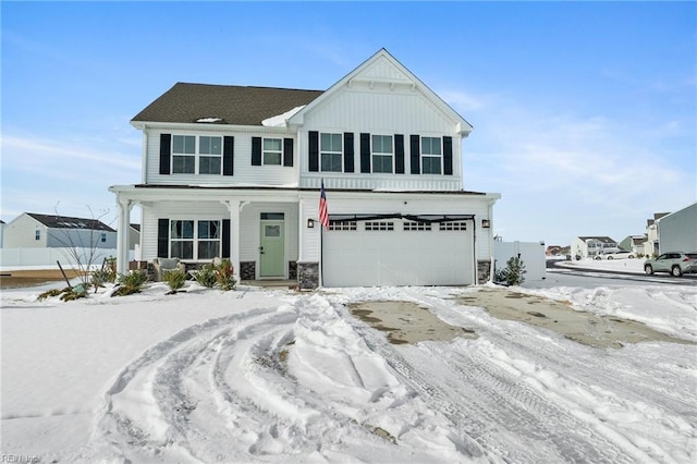 view of front of house with a garage and a porch