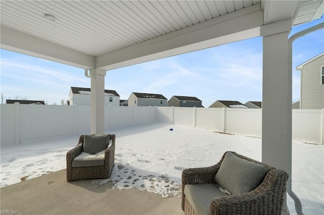 view of snow covered patio