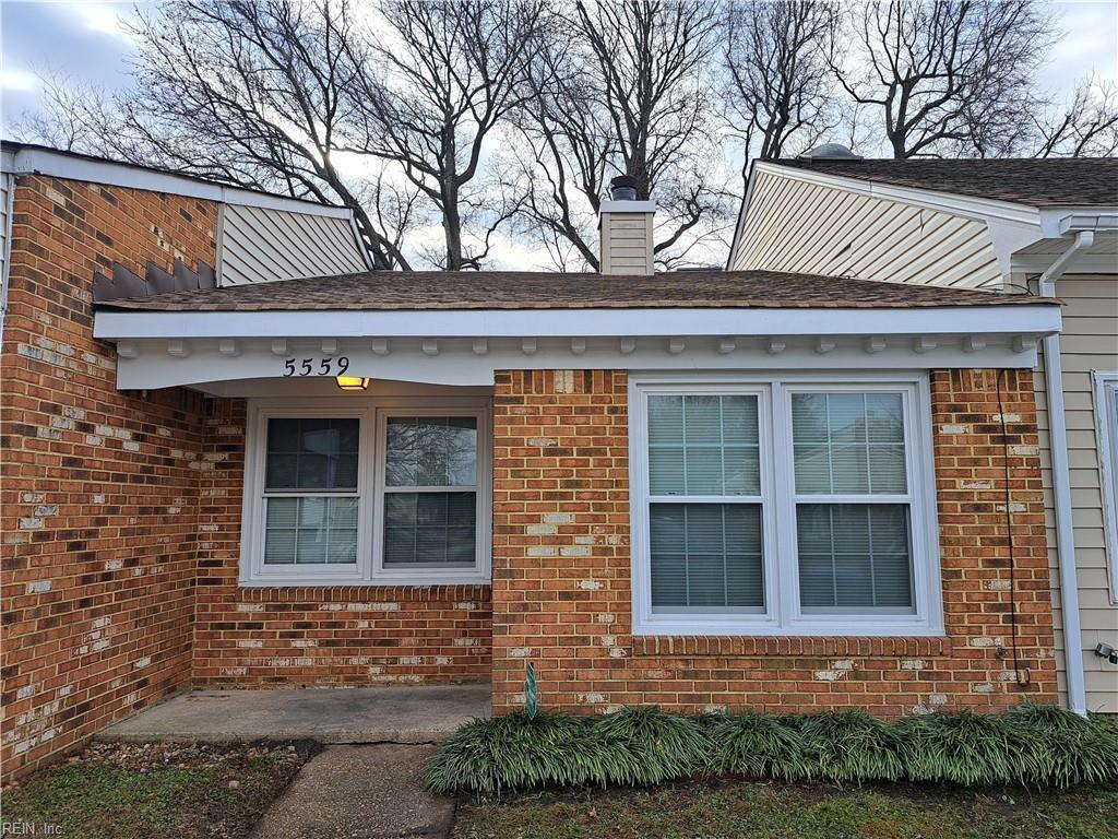 view of side of home featuring a patio area