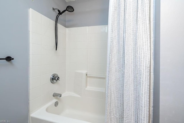 bathroom with shower / tub combo