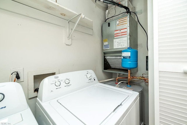 laundry room with independent washer and dryer