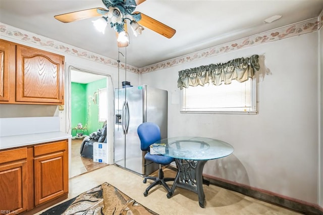 dining space with ceiling fan