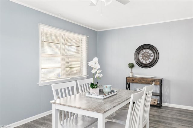 dining area featuring crown molding, dark hardwood / wood-style floors, and ceiling fan