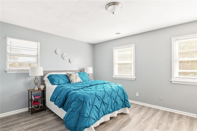 bedroom featuring hardwood / wood-style flooring