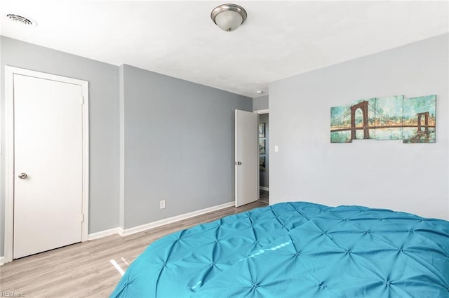 bedroom featuring light hardwood / wood-style flooring